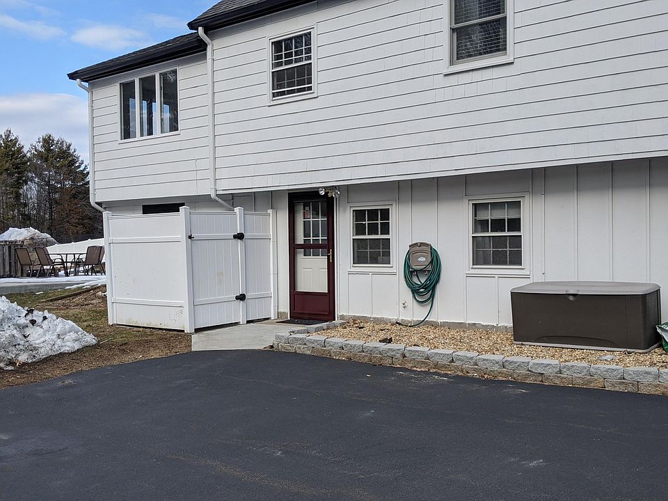 Walk-out Basement Apartment with ample driveway parking. Access to yard and patio (partially seen on the left)
