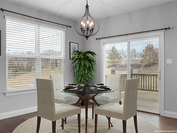 Virtually enhanced to show off the breakfast area.