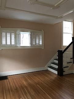 living room, staircase leading to 2nd floor