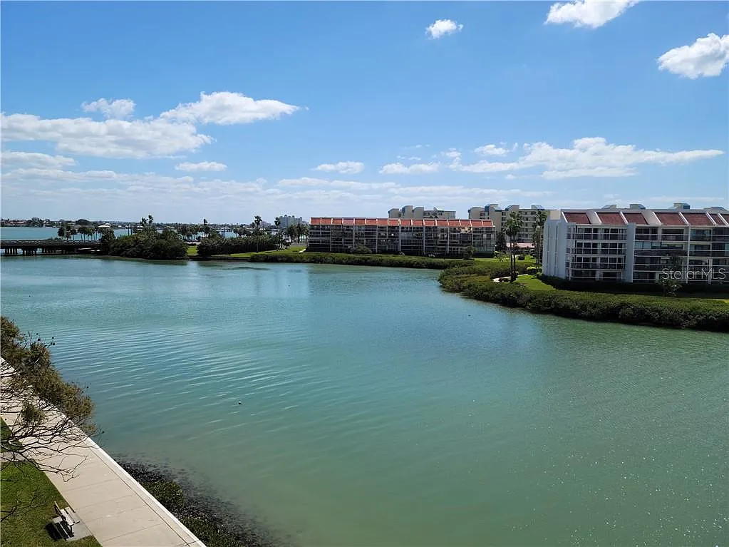 Long term 2/2 condo 55 plus gated, waterfront 4th floor corner unit — Photo 1