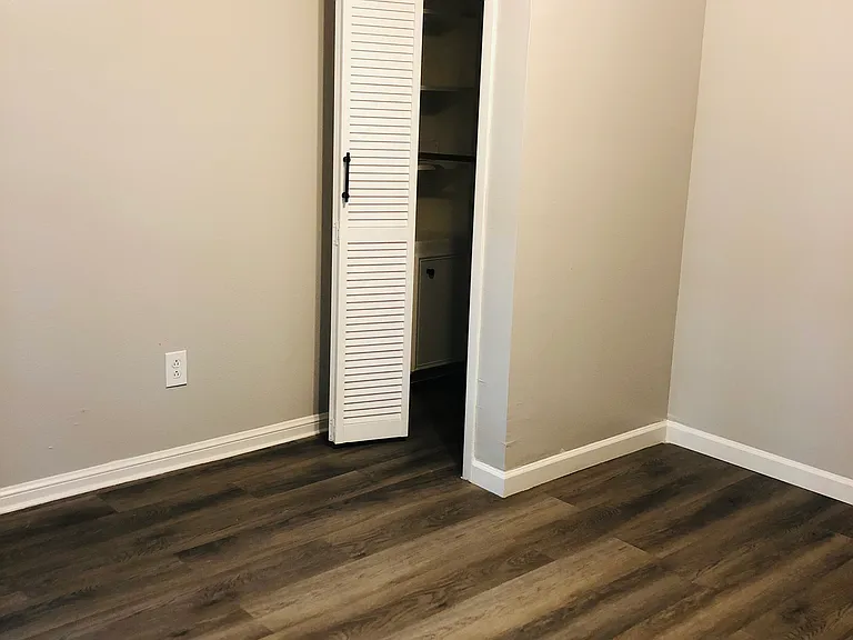 4th bed or office. French doors lock for privacy. Has closet and book shelves.