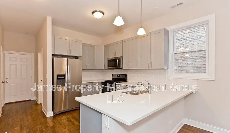 Building Photo - 827 N Francisco Ave #2