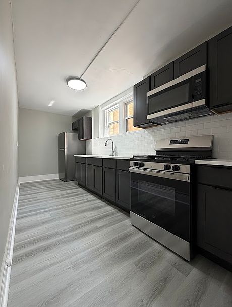 1st image of 138 E 7th St APT 7