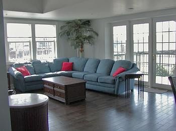Windows surround the main living area giving a great view of the river.