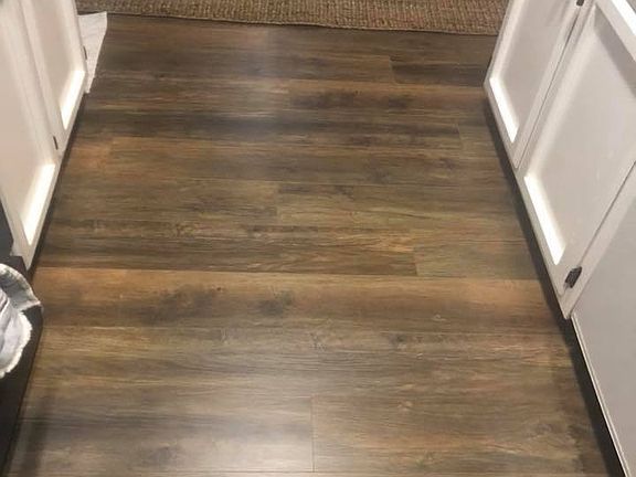 Laminate flooring throughout