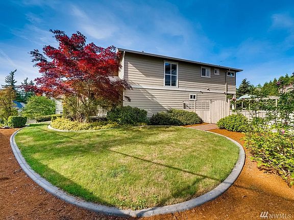 Huge side yard with beautiful landscaping