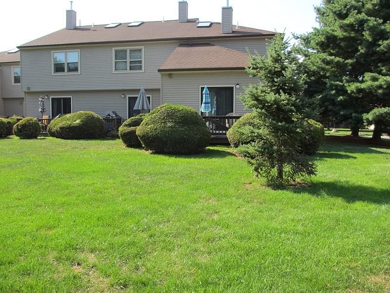 End Unit With Two Assigned Parking Spaces in
        Front