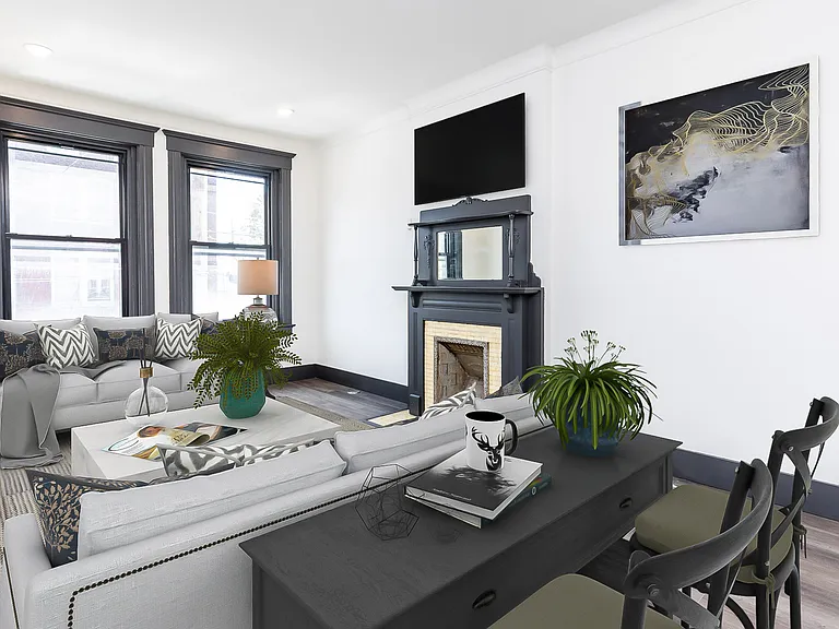 Spacious great room opens to kitchen and includes new windows, mini split hvac, luxury vinyl plank flooring, cool original fireplace (doesn't work) tall ceilings, and room for office space!