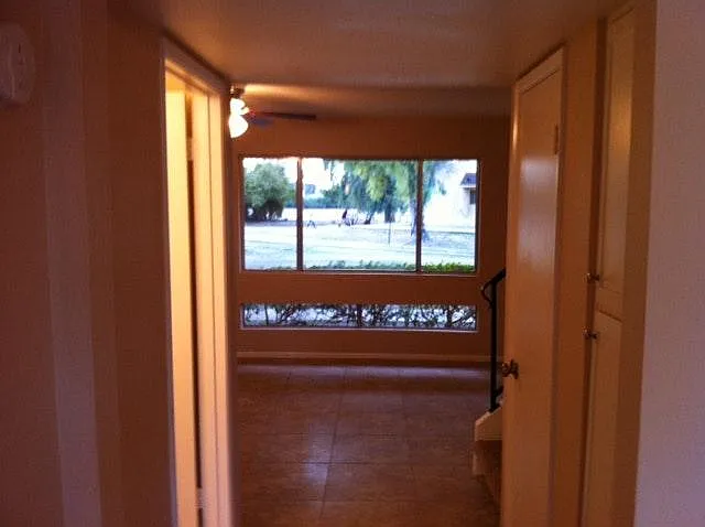view into family room with views of greenbelt area
