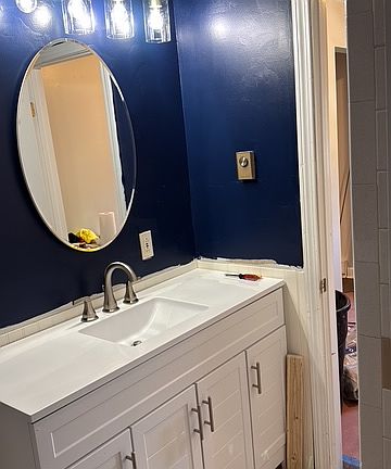 Bathroom not quit complete but actual bathroom.