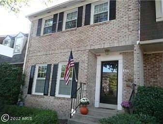 Wide, brick townhouse