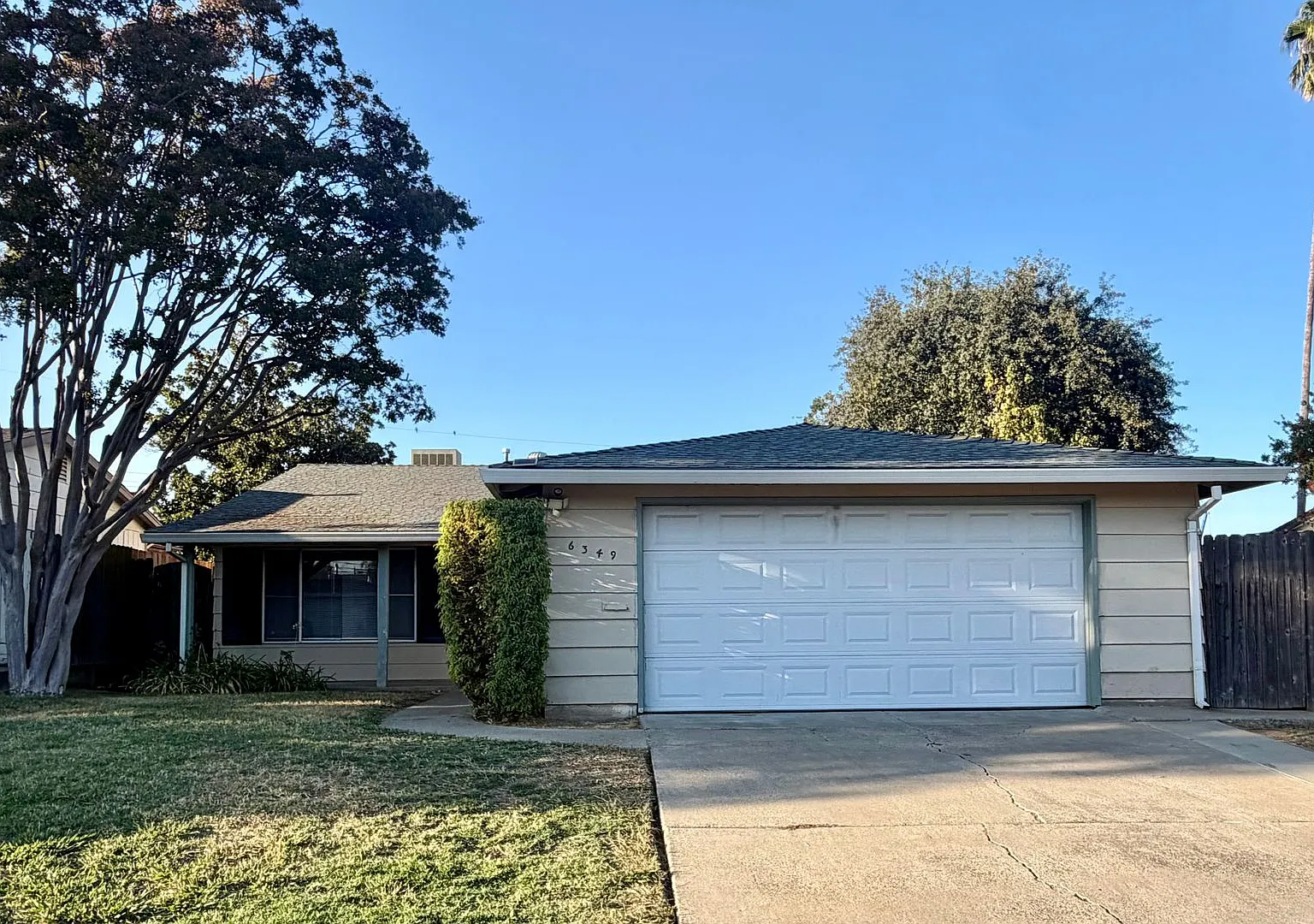 6349 Edgerton Way | 3-Bedroom Carmichael Home with a Sunroom, Fenced Yard & 2-Car Garage — Photo 1
