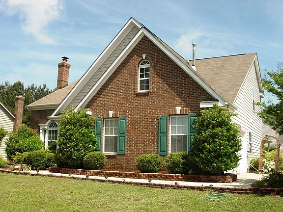 Brick front and vinyl siding on the sides and rear
