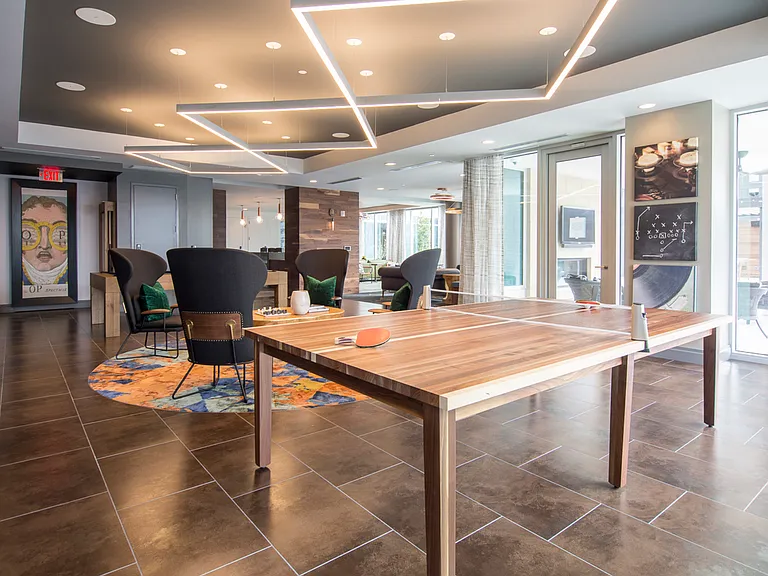Impressive Clubroom with Entertainment Space, Billiards and Ping-Pong, and HDTVs