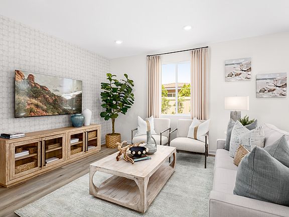 Model home living room with custom wallpaper