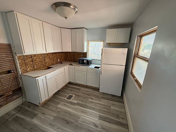 New Kitchen, still under construction, will be ready by May 1. Will include Stove/Oven, Microwave, Sink, Refrigerator. Current plan will include Butcher Block countertop.