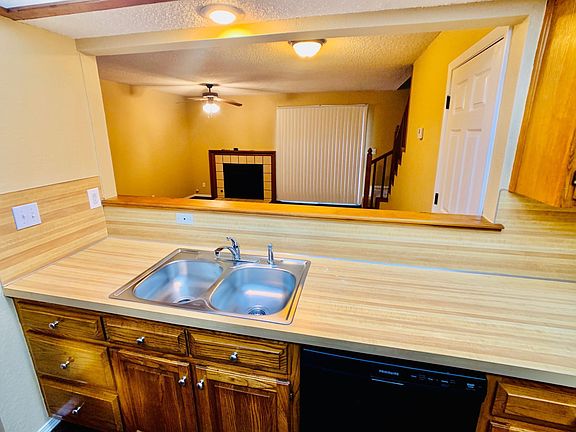 Kitchen looking into living room