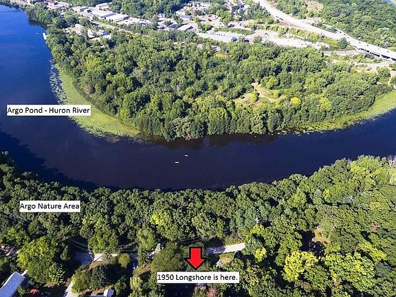 Aerial shot with 1950 Longshore in the center lower portion of the frame. Numerous access points to Argo Nature Area along the road with one being almost directly across the street.