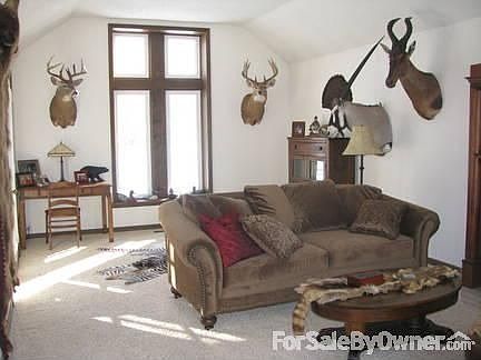 Great Room
						:
						Large room features a fireplace and doors leading to our spacious deck.