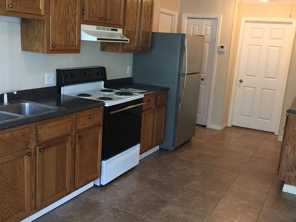 Front door facing kitchen