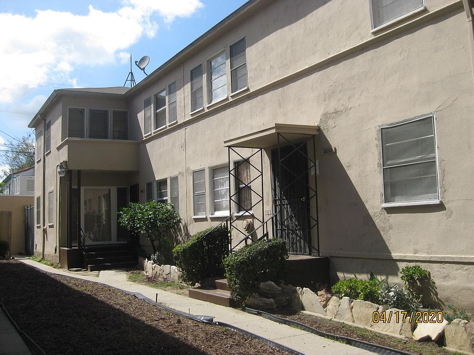 4249 Degnan Apt 3 is a front street facing upstairs apartment with view of trees on Degnan Blvd