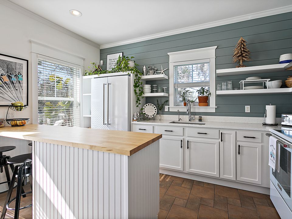 Large, modern kitchen with new appliances.