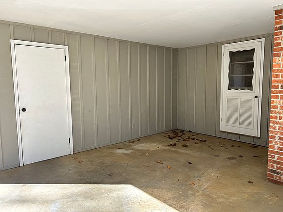 Front Porch Outside Bonus Room with Door to Over-sized Double Garage