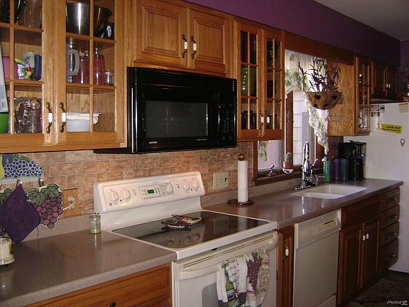 Beautifully Updated Kitchen(Corian countertops, Ceramic Floors)