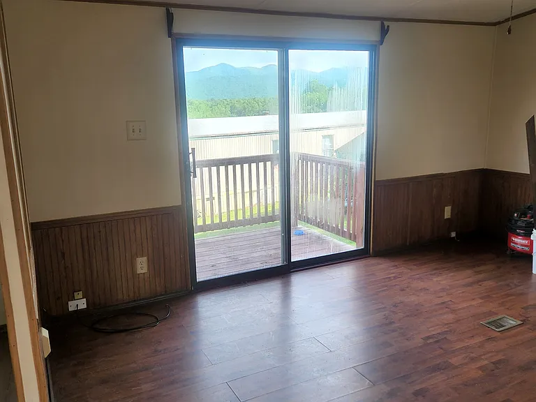 Living room looking to sliding glass doors