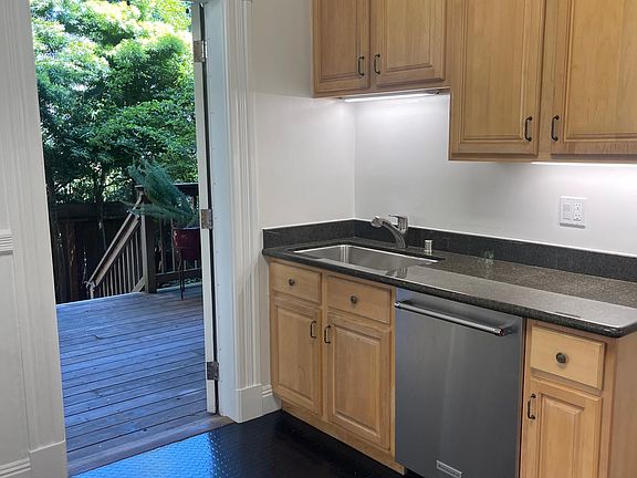 Kitchen Door leading to -private deck - private garden - exclusive use washer dryer