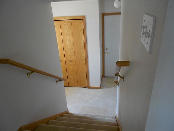 steps from foyer/entry to living space