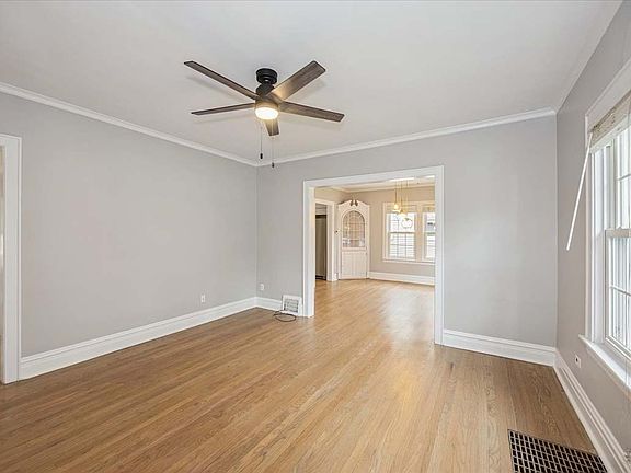 Large living room, refinished hardwood floors throughout 1st floor.