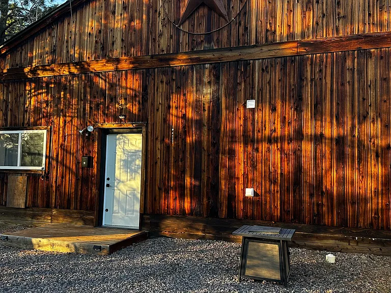 Enjoy sitting around your private gas firepit with a woodsy, countryside view and gorgeous sunsets.