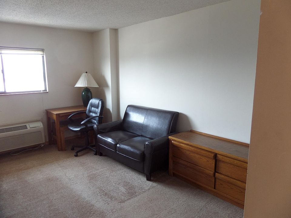 Love seat, dresser, desk and window that opens