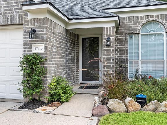 Front entrance includes a storm door that provides protection to the front door. In addition, it helps to add more light into the home as well as provide savings on energy costs. Windows were also upgraded to Energy Efficient windows by Power Home Re