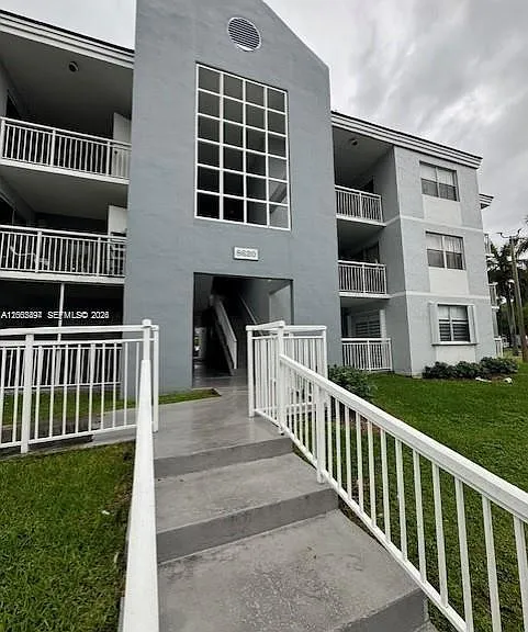 8620 SW 212th St #103 — Photo 1