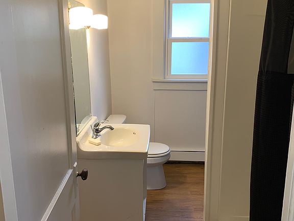 Bathroom with walk-in shower.