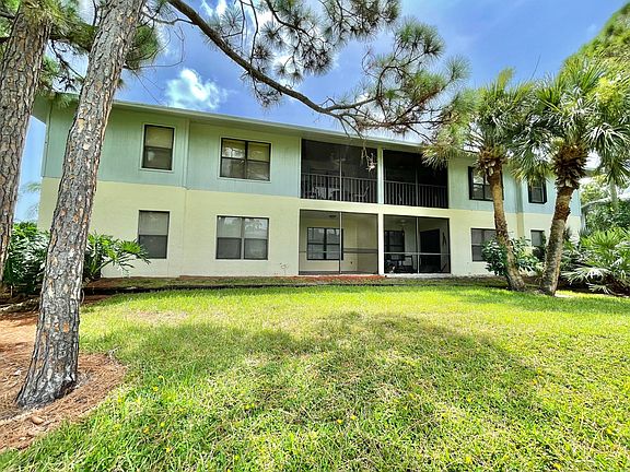 Condo exterior with private outdoor patio