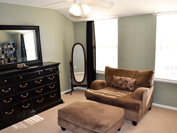 Huge master bedroom with dressing and sitting area.