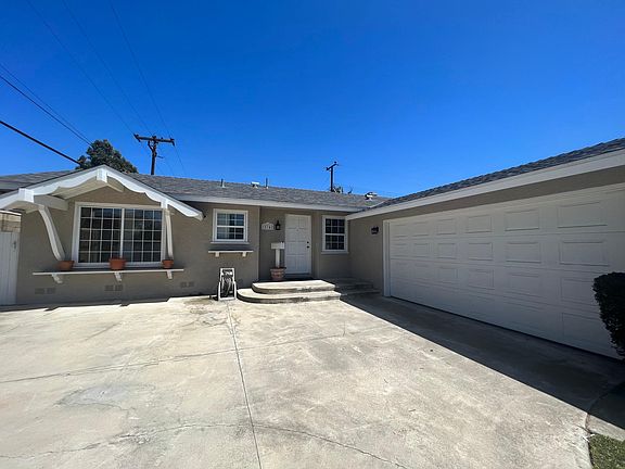 Spacious driveway and attached garage