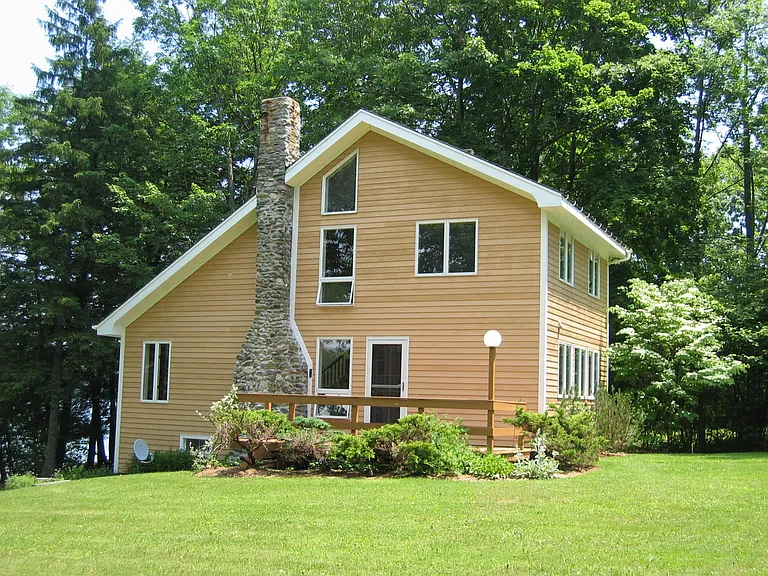 West Side view - 1930s fireplace - Cedar clapboard - Asphalt roof