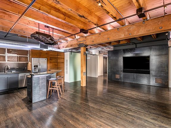 Living area with 75" built-in TV