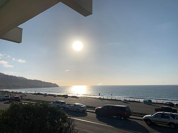 View south to PV from your dining area and kitchen and off of your deck. It is simply stunning! As you can see Paseo de la Playa is a small street with unmetered parking and is very quiet and this unit is in a gorgeous 8 unit craftsman building and is pri