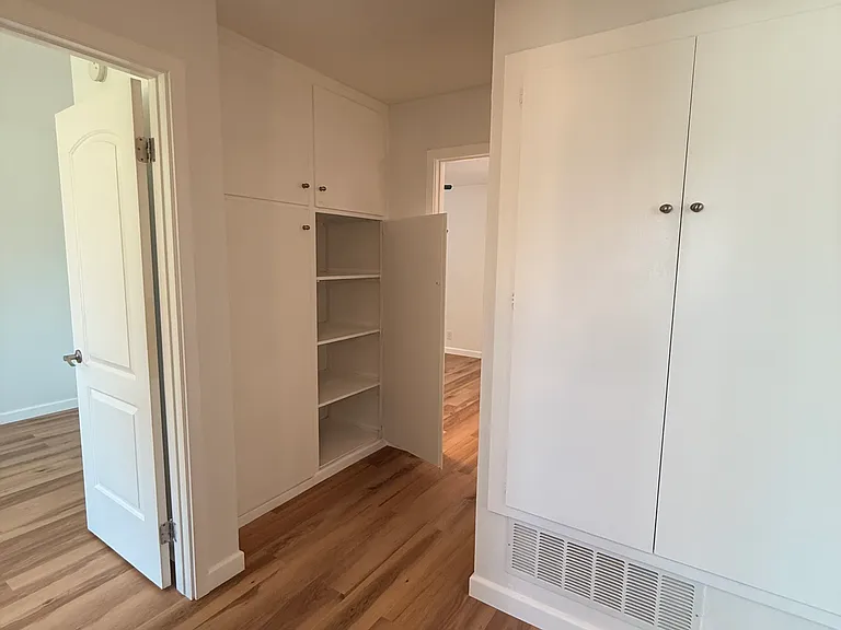 hallway with large closet for storage