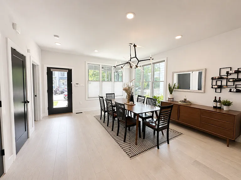 Dining room directly off the kitchen with space for a large 8+ seat dining table.
