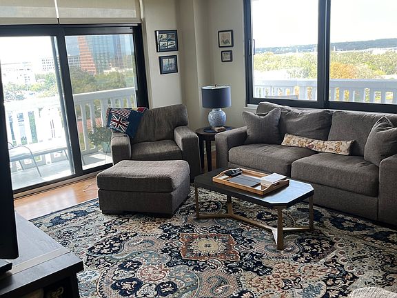living room overlooking both wraparound porch and Park Lake (gorgeous)