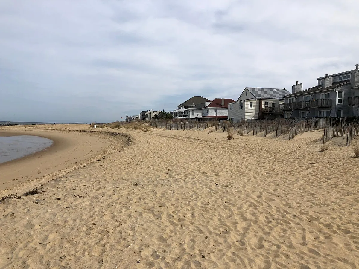 Photo 2 of 19 - 978 W Ocean View Ave #2 - Norfolk, VA view of the house from the beach the house has gable roof - 978 W Ocean View Ave #2