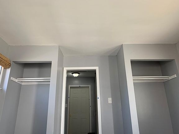 View to kitchenette and to the closets