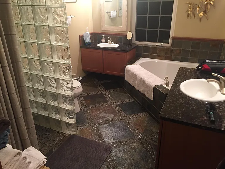 Master bath. Two-person jetted tub. Walk-in shower. Slate floors.