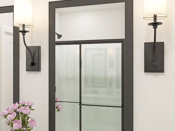 Matte black fixtures in owner s bath